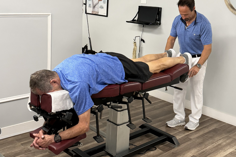 View of Dr. Slossberg performing Chiropractic adjustment at his office near Jacksonville Beach, FL